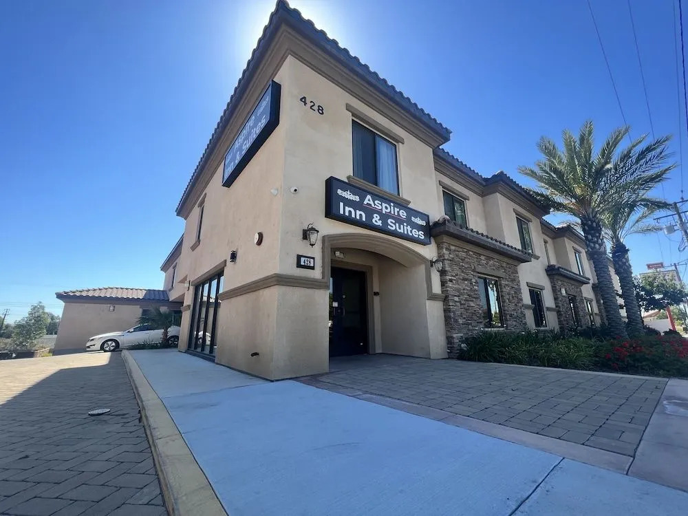 ASPIRE INN & SUITES Orange