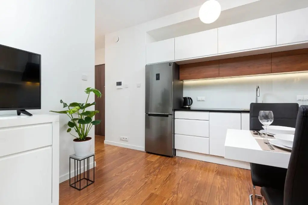 Royal City Center Mennica Residence by Noclegi Renters