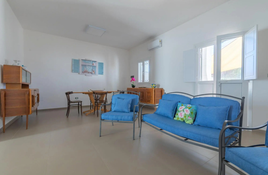 Holiday home with veranda and parking near the sandy beach of Punta Prosciutto-Stella Marina