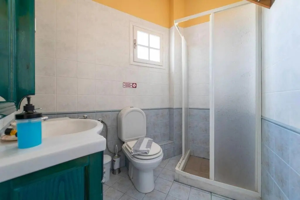 Santorious Flower Covered Apartment