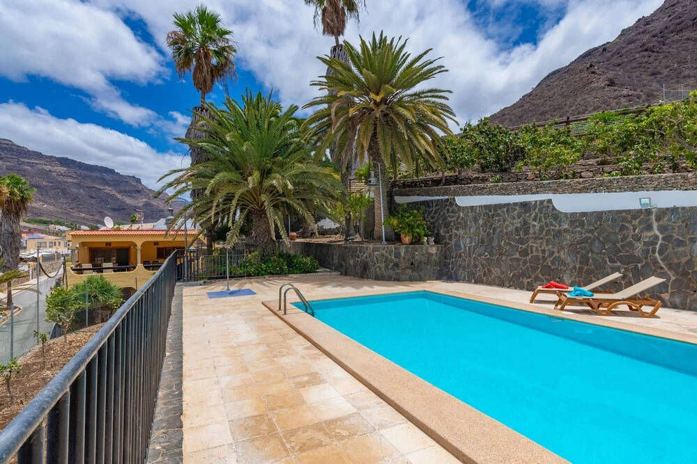 Casa de vacaciones con piscina compartida en Mogán IV