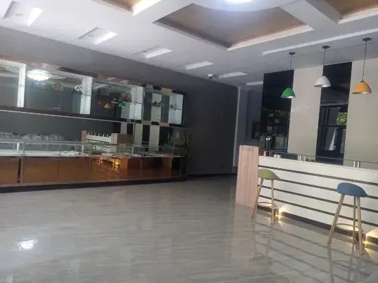 Home Inn Huaxuan Hotel (Duolun Longzehu Branch)