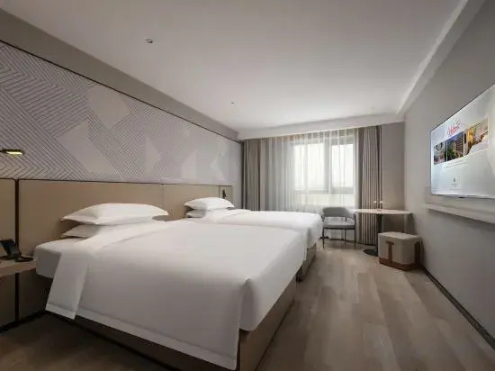 Berman Hotel (Zhanjiang Wuchuan Jiefang Middle Road Gangfeng Plaza)