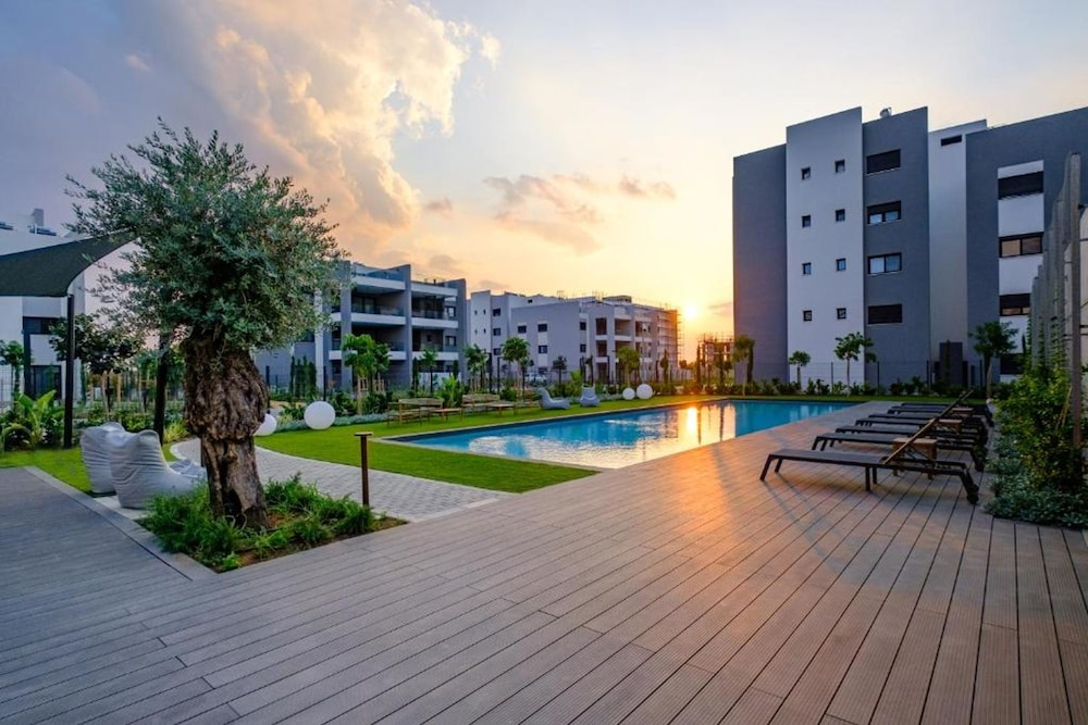 Rooftop Sunset Garden by Staycom