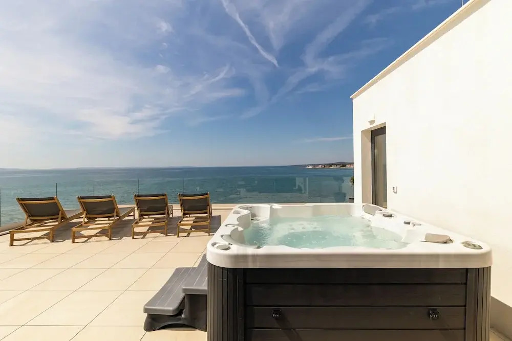 Aqua Blue by Belmont Realty