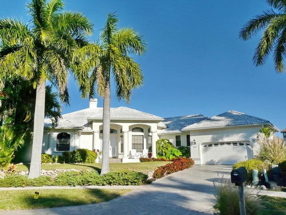 Waterfront home on key lot with pool, spa and views