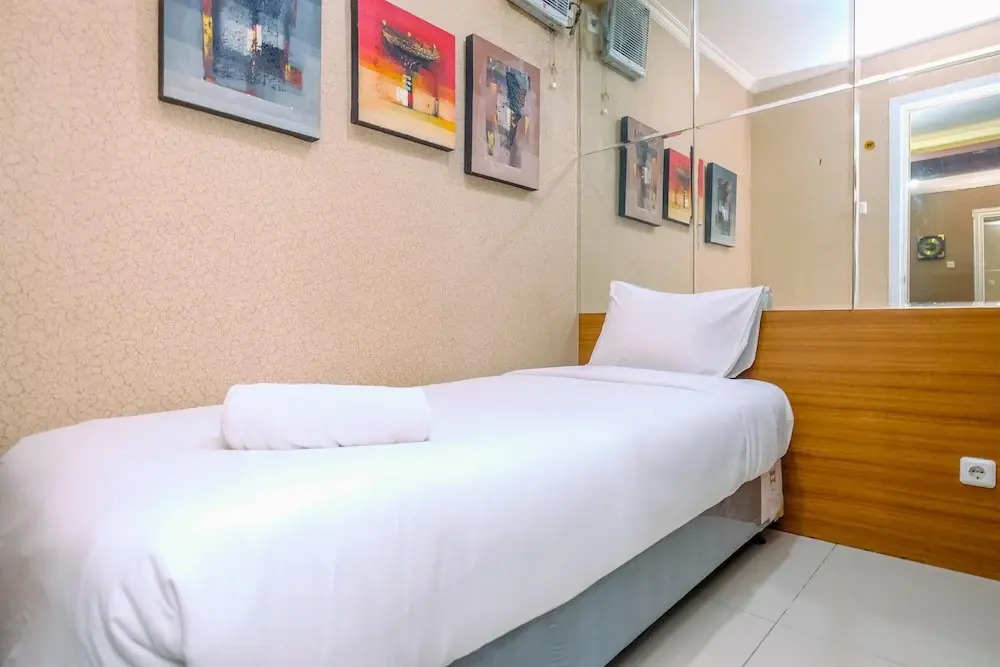 Comfy and Great Choice 2BR Green Pramuka City Apartment By Travelio