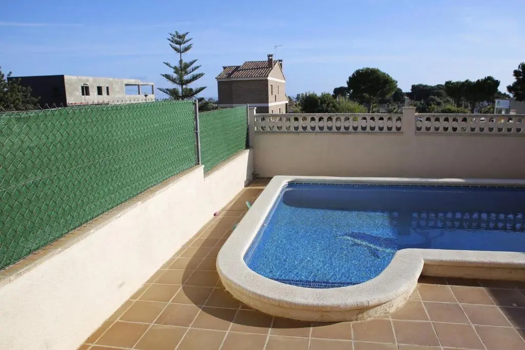AT130 Casa con piscina privada, aire acondicionado y garaje
