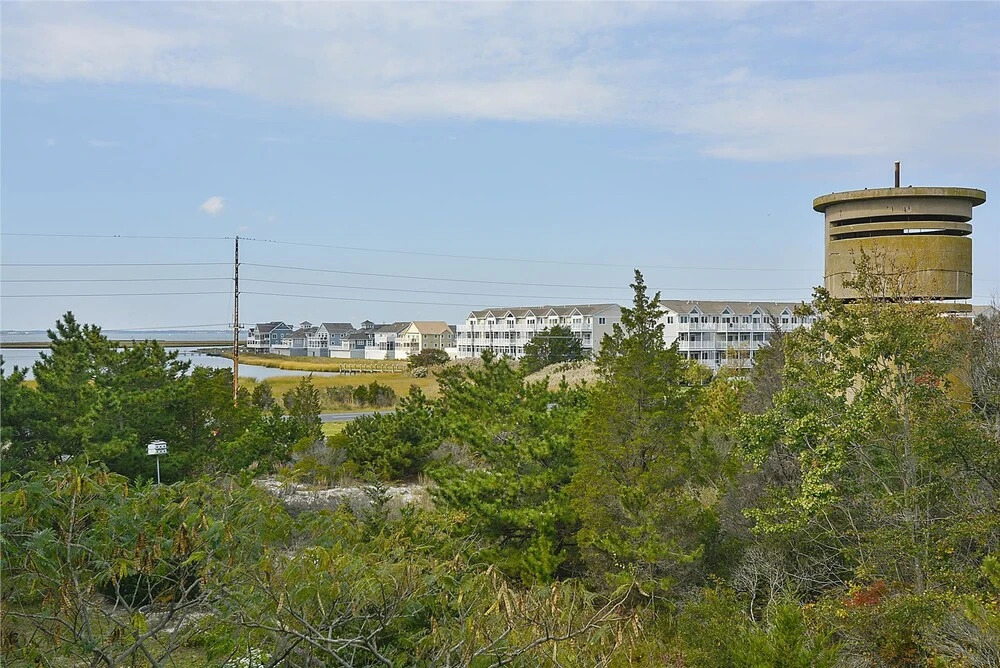 Sand Tree Atlantic Watergate 43 by Long & Foster