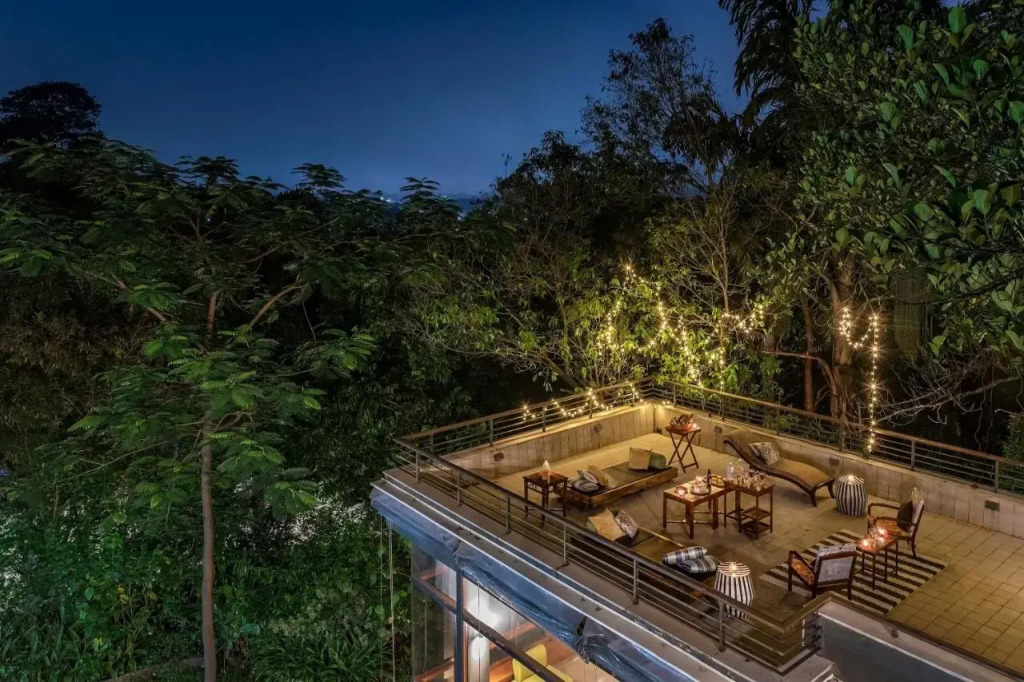 SaffronStays Odeon - 4BR heritage art deco villa with cantilever pool, verandahs & forested lawns