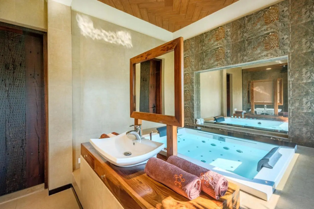 SaffronStays Althea - 4BR veg-only luxury villa with pool, jacuzzis, gourmet meals and Lohagad-Pawna lake views