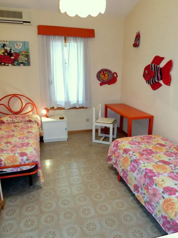 Lignano Riviera con 3 camere e giardino