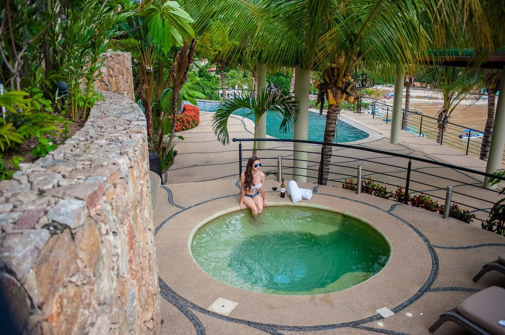 Luna Suite with two king size beds, with walk out terrace overlooking the beach
