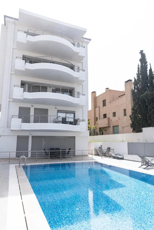 Design Apartment with swimming pool near the beach (A1)