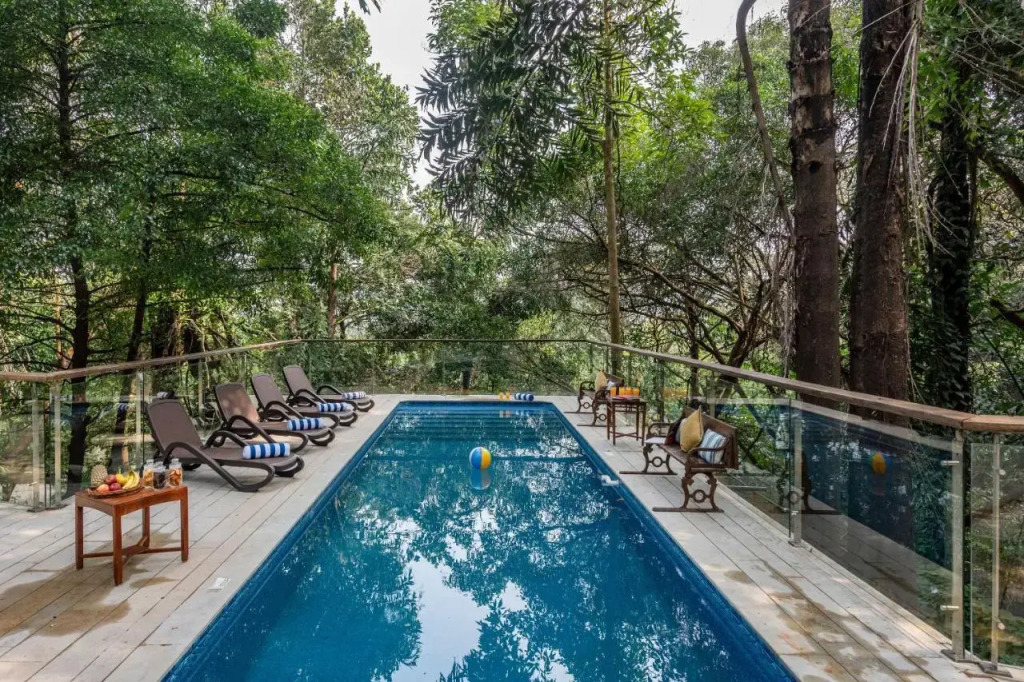 SaffronStays Odeon - 4BR heritage art deco villa with cantilever pool, verandahs & forested lawns
