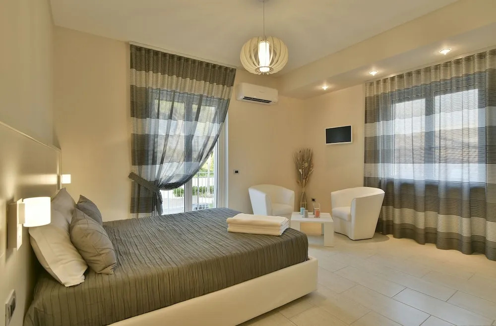 Tolomeo Rooms