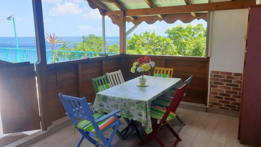 Bungalow d'une chambre avec vue sur la mer jardin clos et wifi a Deshaies