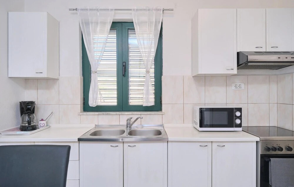 Nice Home in Podstrana With Outdoor Swimming Pool, Wifi and 2 Bedrooms