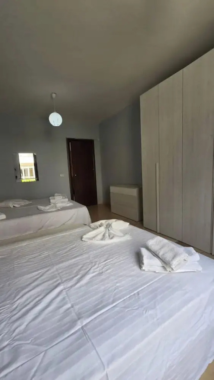 Tirent Apartment - Cozy Bedrooms Stay by Golem Beach.
