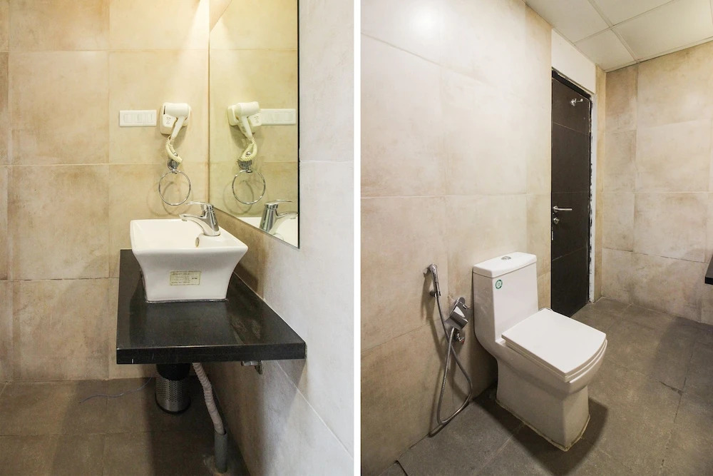 Capital O 15964 NI Ambaari Suites