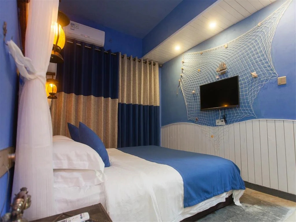 Haikou Times Theme Inn