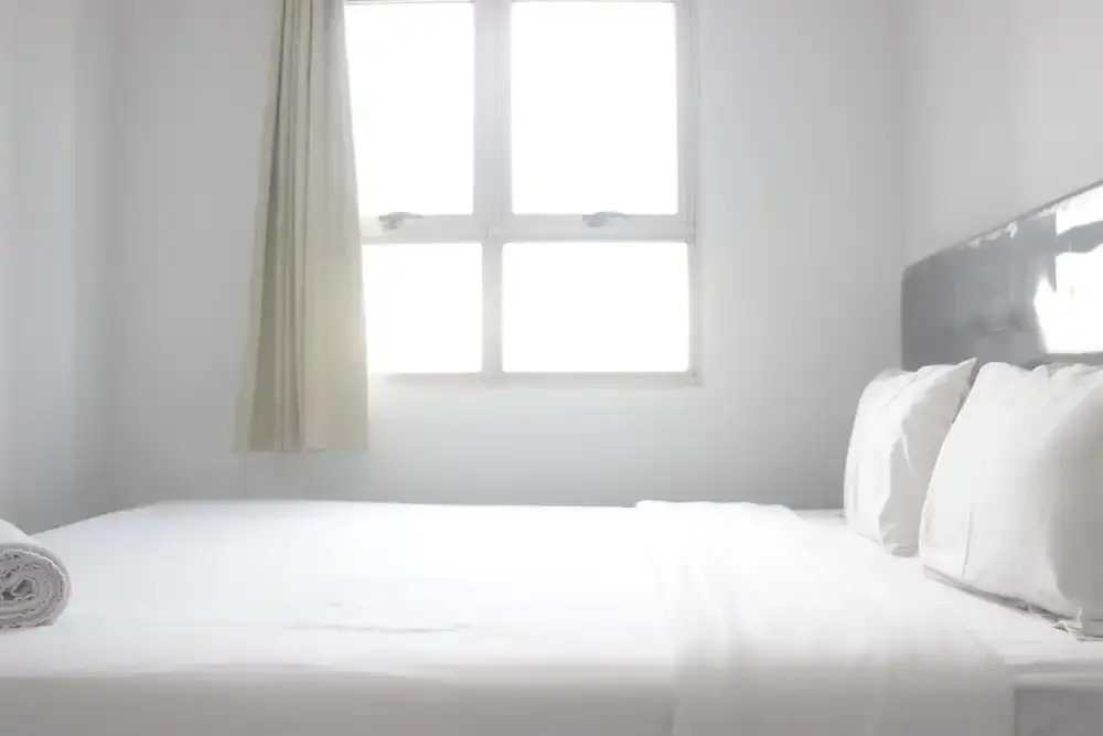 Bright and Relaxing 2BR Apartment at Mekarwangi Square Cibaduyut By Travelio