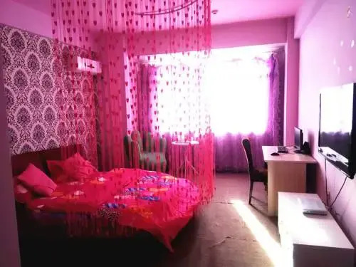 Tangtang Theme Apartment Holiday Hotel
