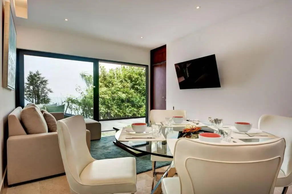 Brand New Classy Condo Just Steps from the Beach
