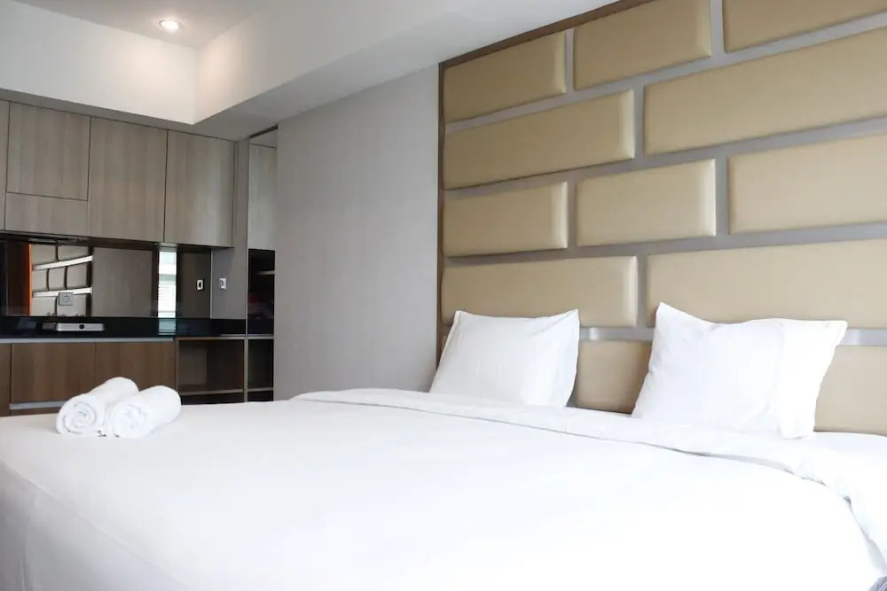 Trendy & Comfy Studio at Tamansari la Grande Apartment