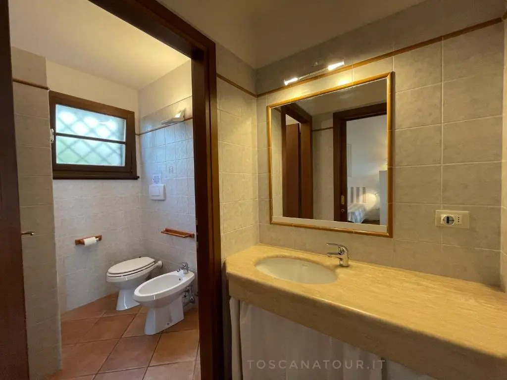 Casa "Ale" con piscina comune e bellissimo giardino a 5 minuti dal mare
