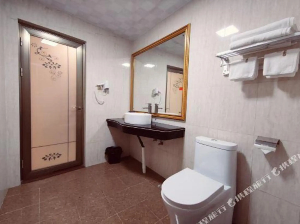 Youge Shangpin Hotel (Xinxing Times Square Bus Station)
