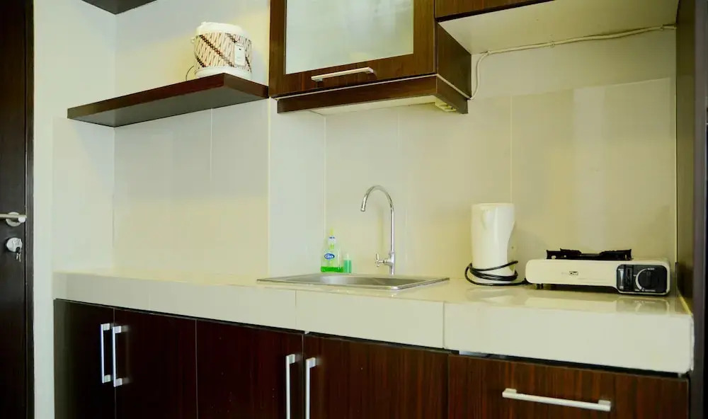 Simply Studio Room Atria Residence Apartment near Summarecon Mall By Travelio