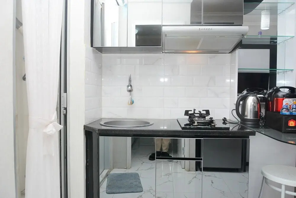 Tranquil and Comfy 2BR Bassura City Apartment near Mall By Travelio