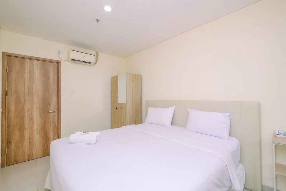 Homey and Fully Furnished 1BR Apartment at Pejaten Park Residence By Travelio