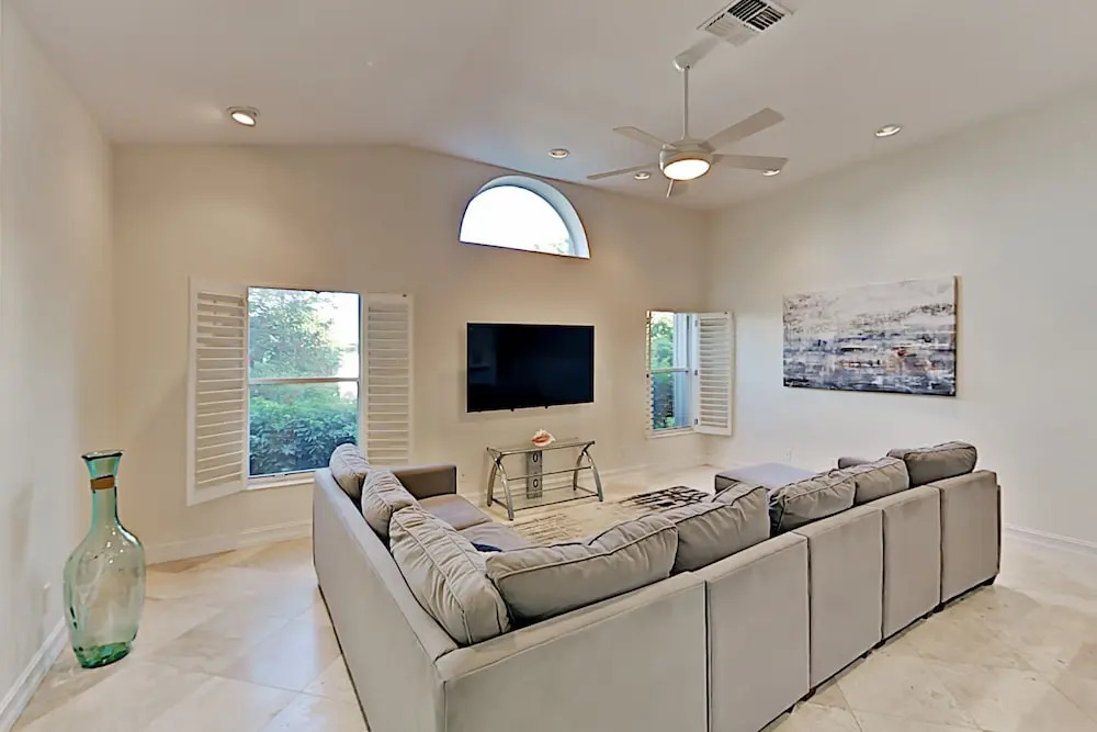 Canal-front W/ Boat Dock & Screened Pool 4 Bedroom Home
