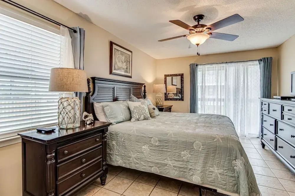 Sandy Shores West Unit 202 by RedAwning