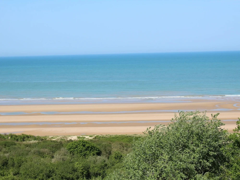 Sleek, Modern and Spacious Villa With the Invasion Beaches in the Back Garden