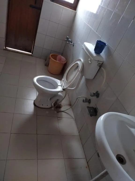 Goroomgo Shah Guest House Nainital