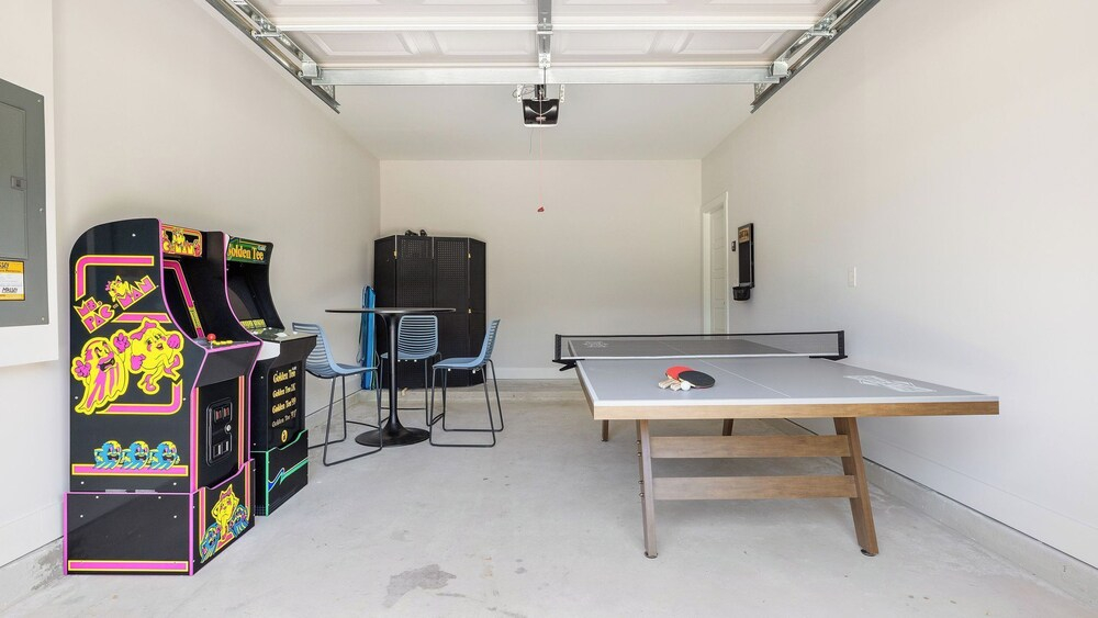 Playfully Designed Home + Hot Tub, Fire Pit & Game Room Blue Hour by Avantstay