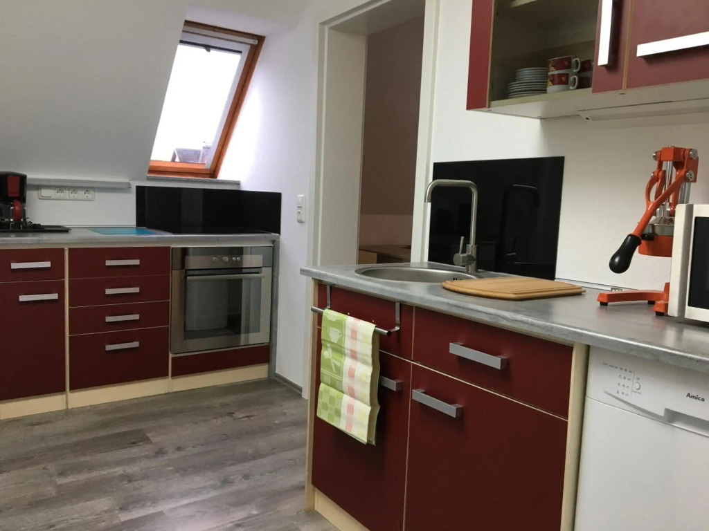 Ferienwohnung „Im Kleinen Löök“ - DG - 2 Zimmer - Balkon - Boxspringbett - 2 TV
