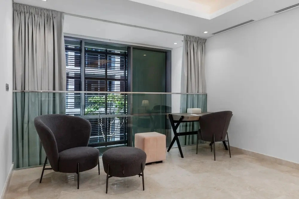 Maison Privee - Exquisite Duplex with Private Patio & Loft Living