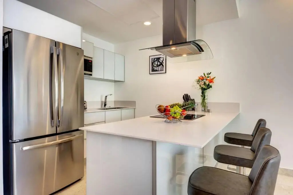 Brand New Classy Condo Just Steps from the Beach
