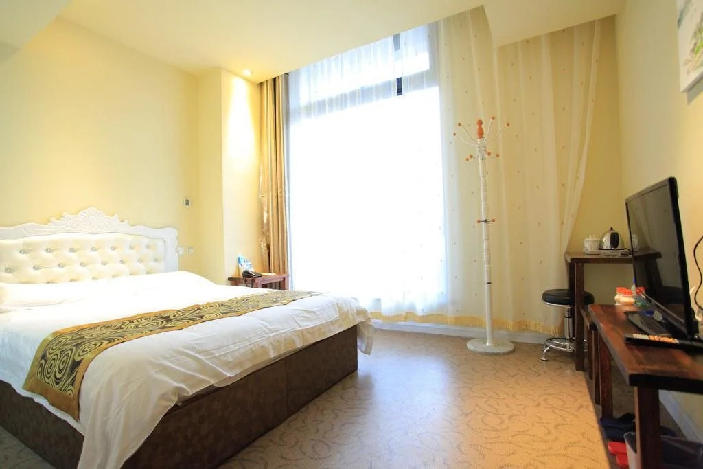 Qingdao Mei'er Xidun Theme Hotel