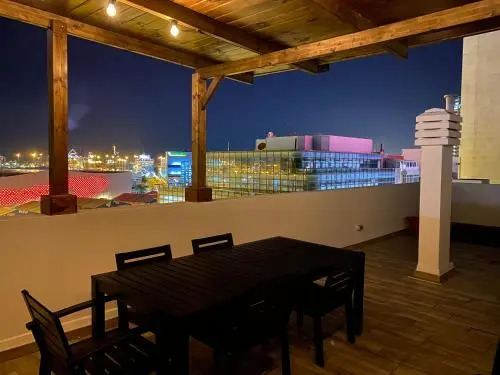 Beach Apartment & Rooftop Lounge