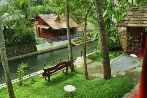 Roomys Nest Ashtamudi Homes