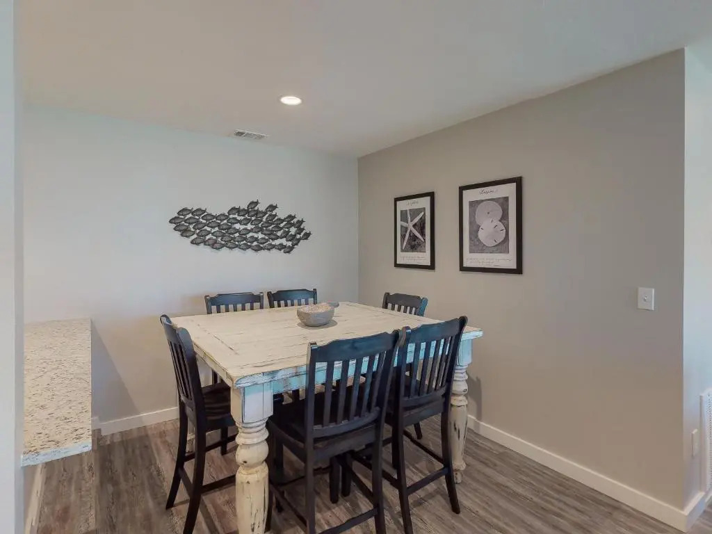 AH-E117 Remodeled First Floor Condo, Across From The Shared Pool & Hot Tub, Near Marina & Ferry