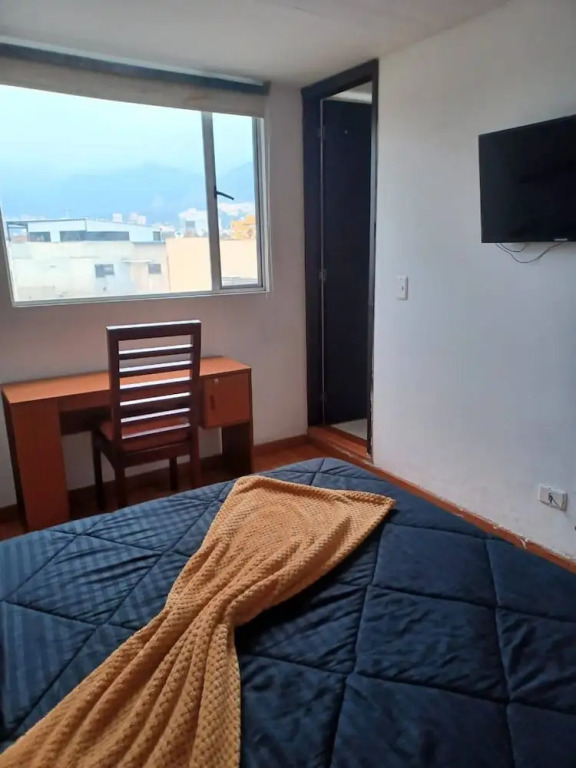 Room in Guest Room - Charming and Cozy Stay in Bogotá's Heart Perfect for Travelling Families!