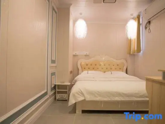 X9 E-sports Movie Homestay (Guanggu Plaza)