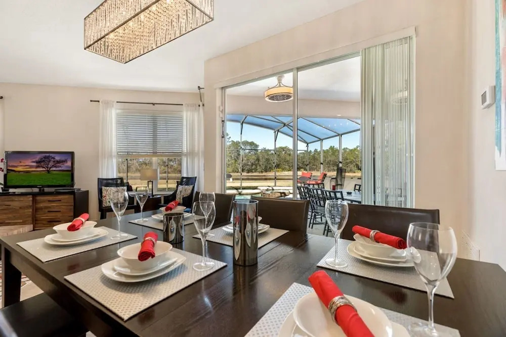 Extended Sunny Pool Deck with Pool and Spa and Lake View in Gated Solterra Resort