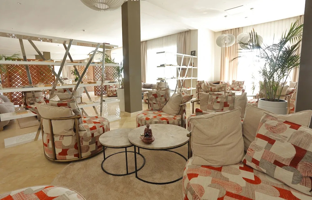 Отель Playa Del Pacha Suites
